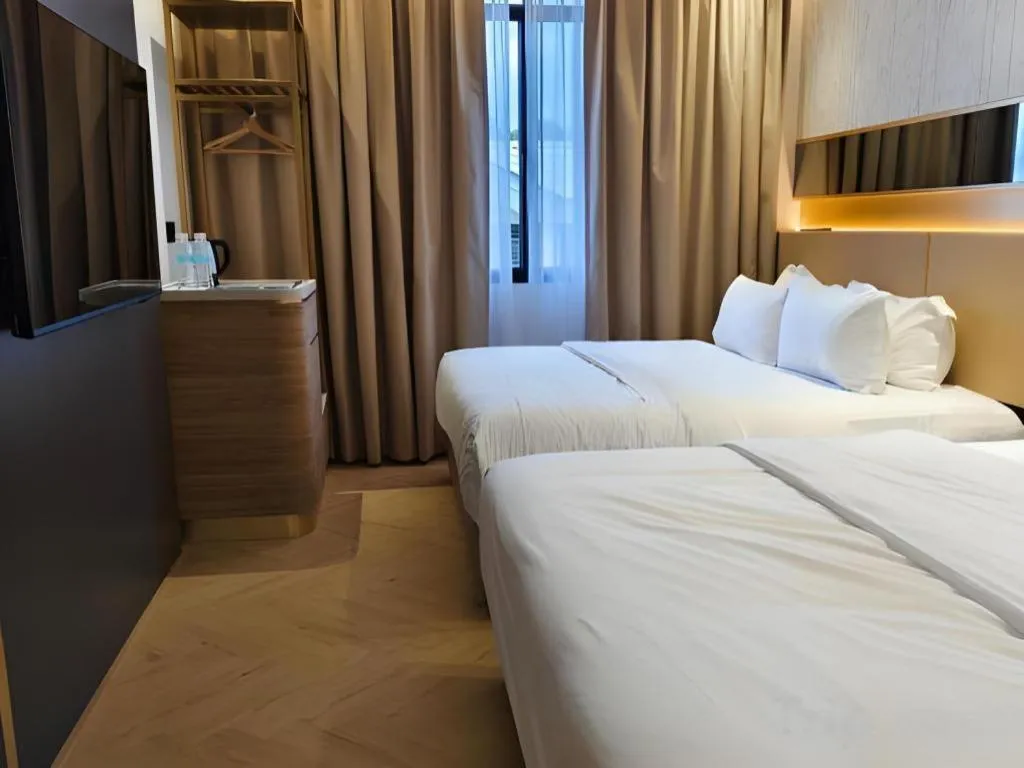 Bed in Grand City Hotel