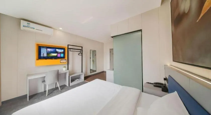 Bed in 7 Days Inn Tai'an Dongpingxi Hualian