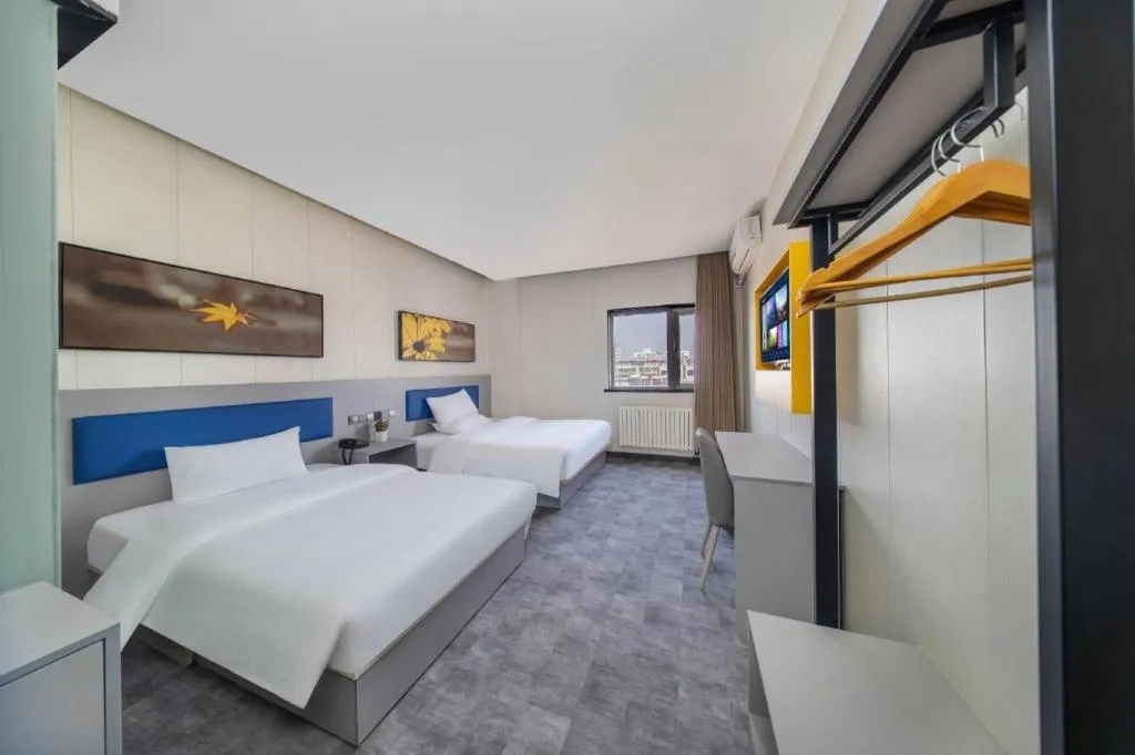 Bed in 7 Days Inn Tai'an Dongpingxi Hualian