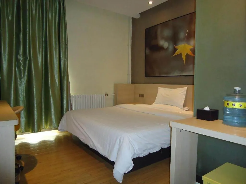 Bed in 7 Days Inn Tai'an Dongpingxi Hualian