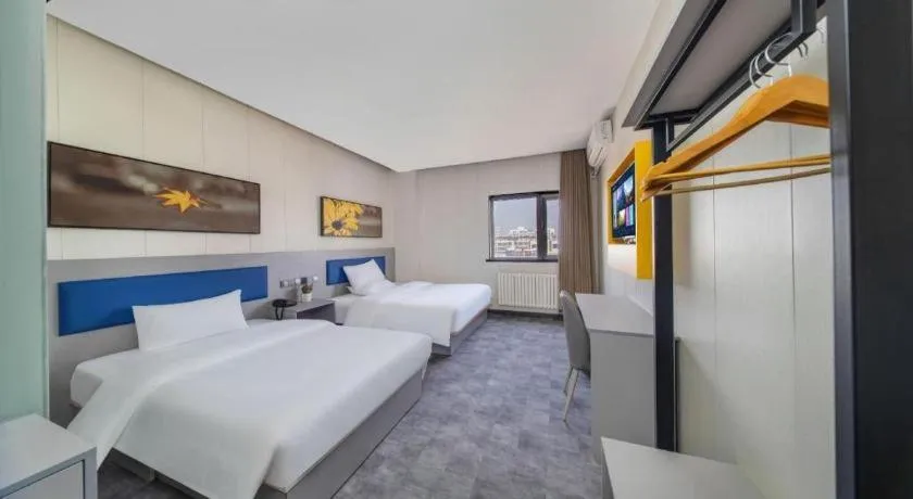 Bed in 7 Days Inn Tai'an Dongpingxi Hualian