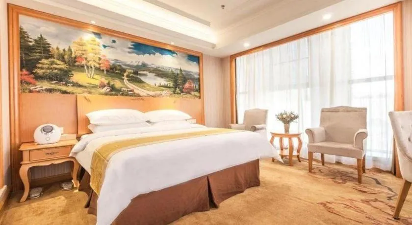 Bed in Vienna International Hotel Kunming Guangfu Road Aegean Shopping Center