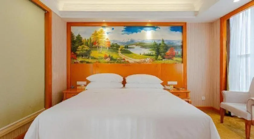 Bed in Vienna International Hotel Kunming Guangfu Road Aegean Shopping Center