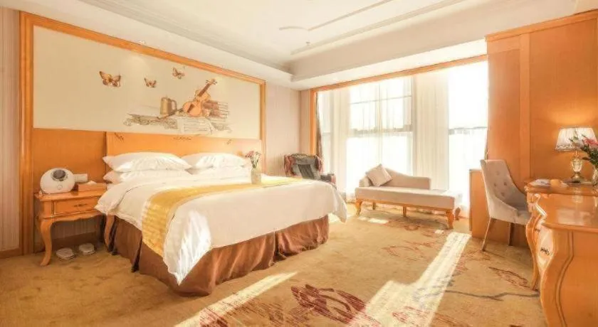 Bed in Vienna International Hotel Kunming Guangfu Road Aegean Shopping Center
