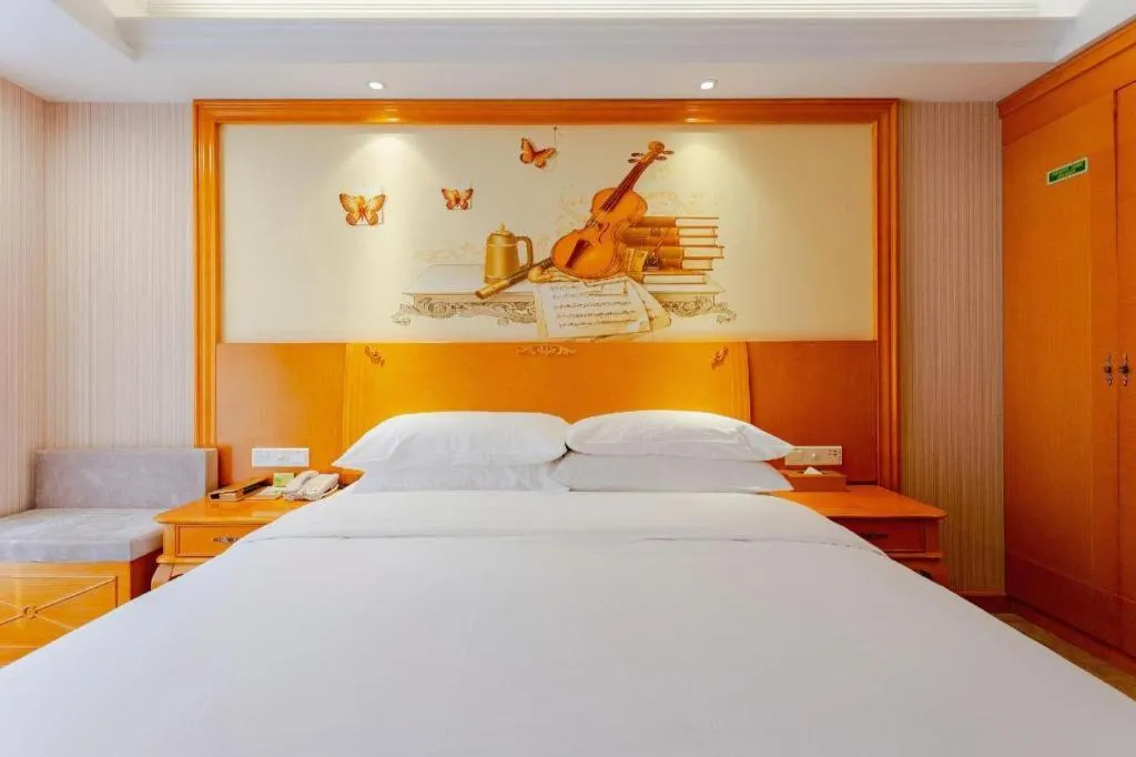 Bed in Vienna International Hotel Kunming Guangfu Road Aegean Shopping Center