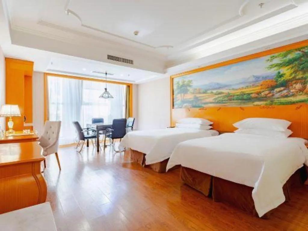 Bed in Vienna International Hotel Kunming Guangfu Road Aegean Shopping Center