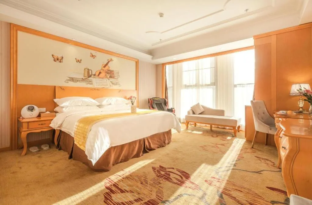 Bed in Vienna International Hotel Kunming Guangfu Road Aegean Shopping Center