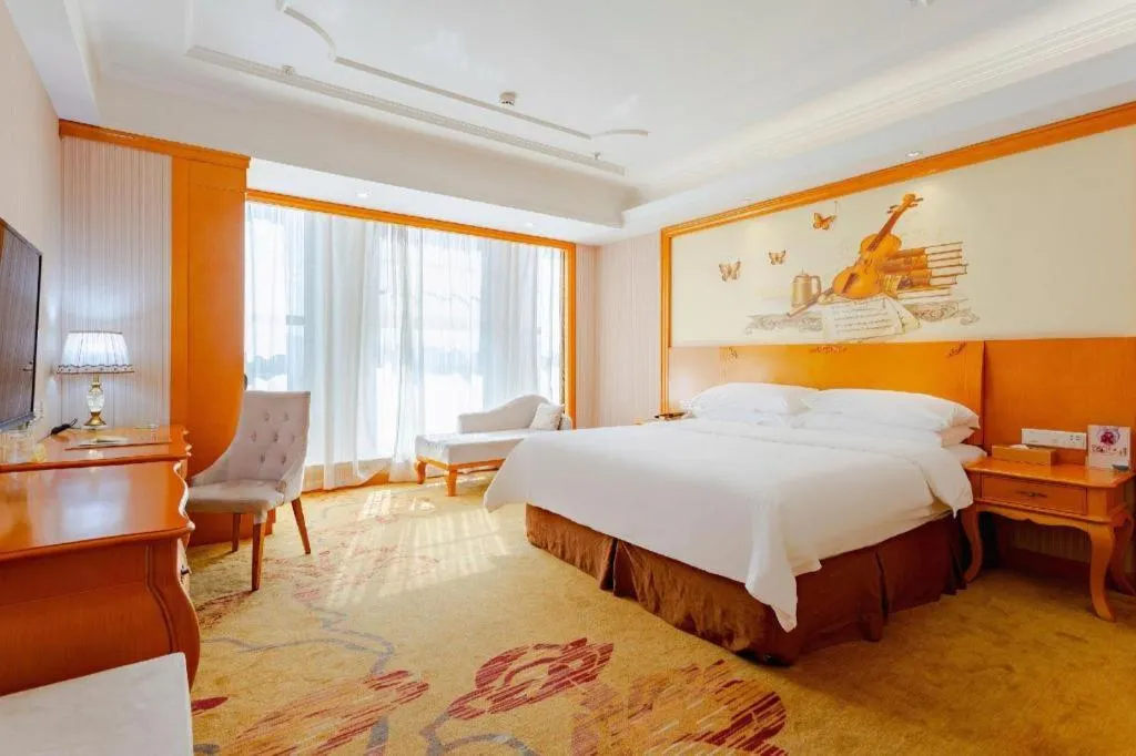 Bed in Vienna International Hotel Kunming Guangfu Road Aegean Shopping Center