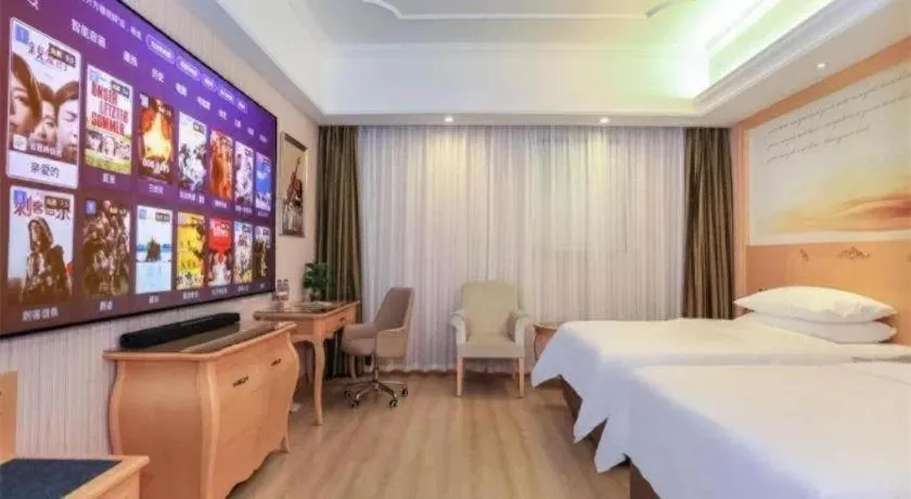 Bed in Vienna Hotel Guangzhou Airport Gaosu Pingsha