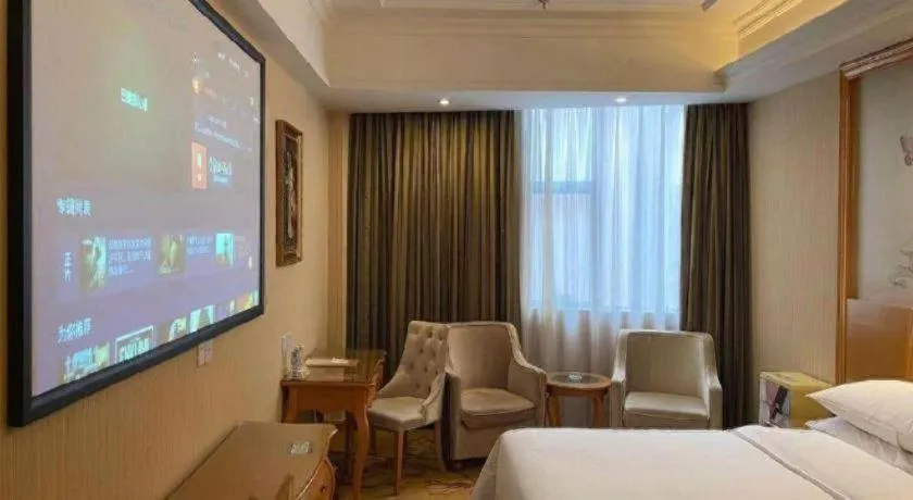 Bed in Vienna Hotel Guangzhou Airport Gaosu Pingsha