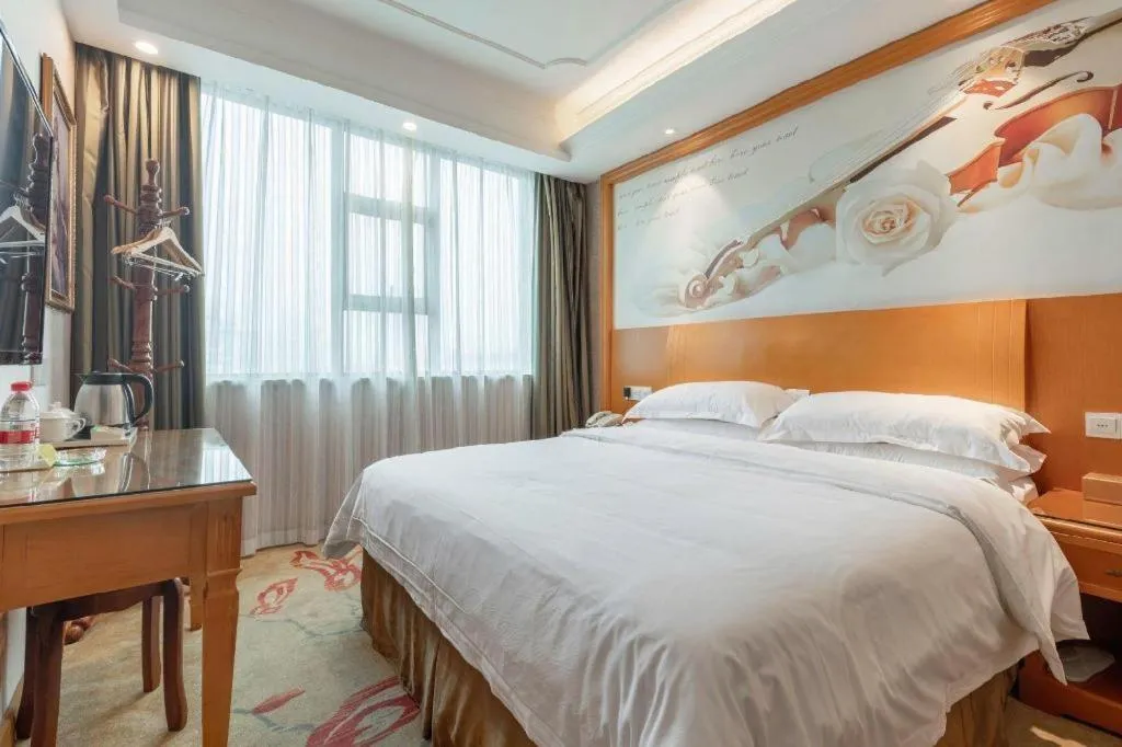 Bed in Vienna Hotel Changsha Wuyi Avenue Railway Station