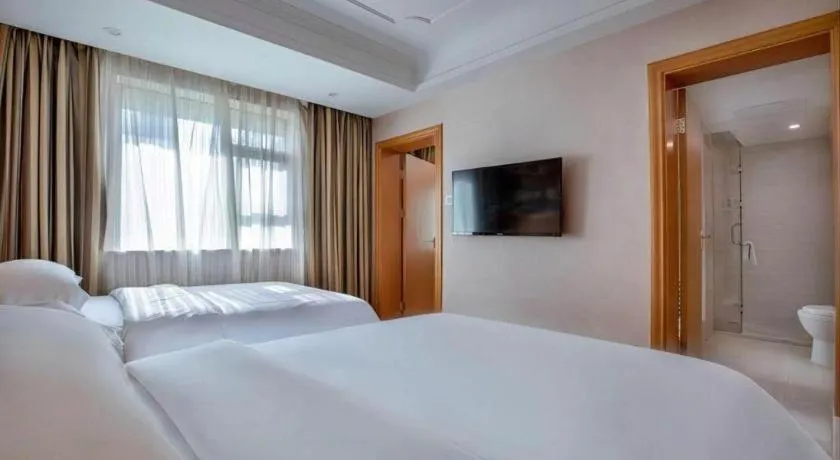 Bed in Vienna Hotel Changsha Wuyi Avenue Railway Station