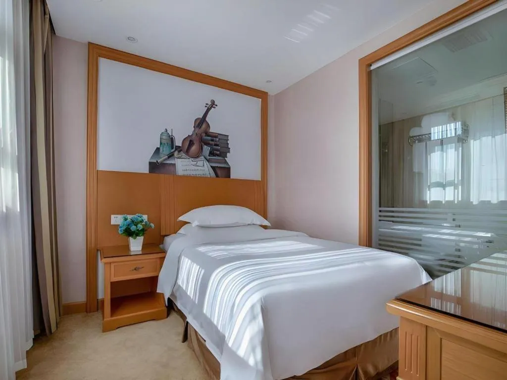 Bed in Vienna Hotel Changsha Wuyi Avenue Railway Station