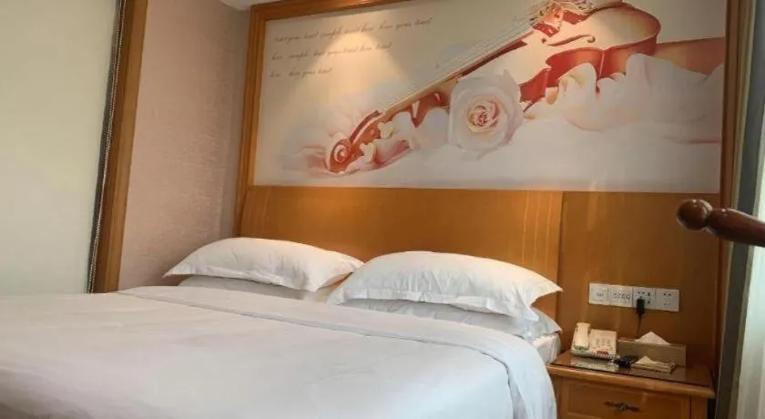 Bed in Vienna Hotel Changsha Wuyi Avenue Railway Station