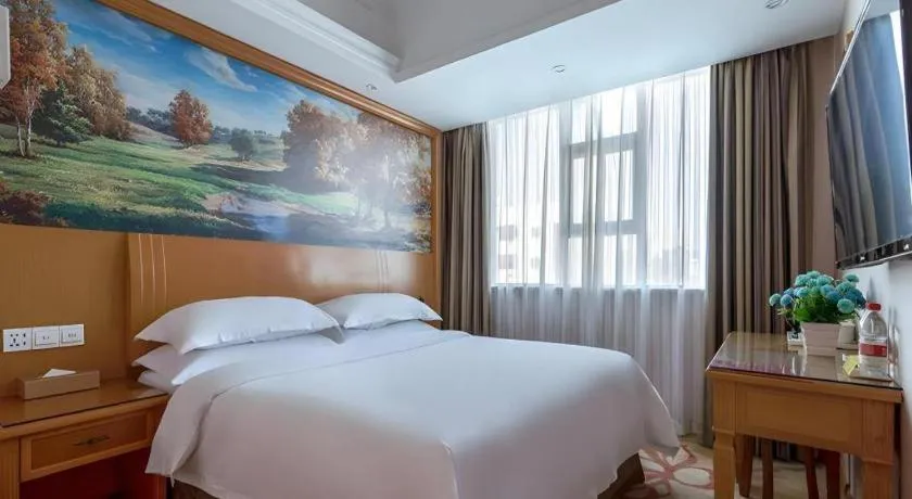 Bed in Vienna Hotel Changsha Wuyi Avenue Railway Station