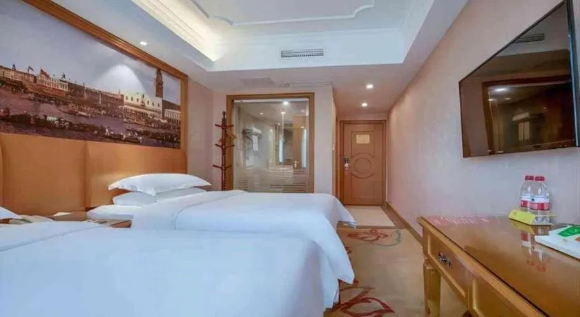Bed in Vienna Hotel Changsha Wuyi Avenue Railway Station