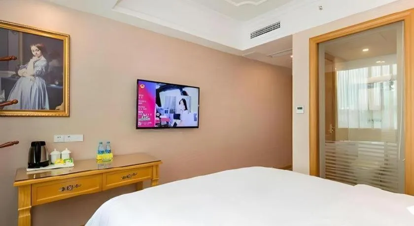 Bed in Vienna Hotel Changsha Wuyi Avenue Railway Station