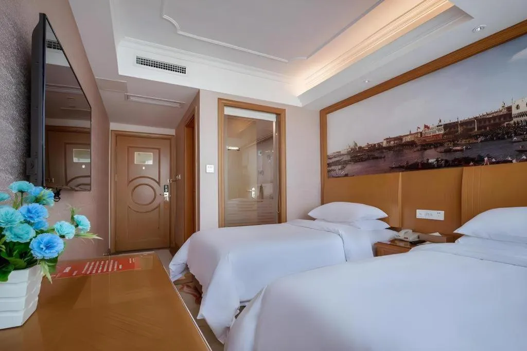 Bed in Vienna Hotel Changsha Wuyi Avenue Railway Station