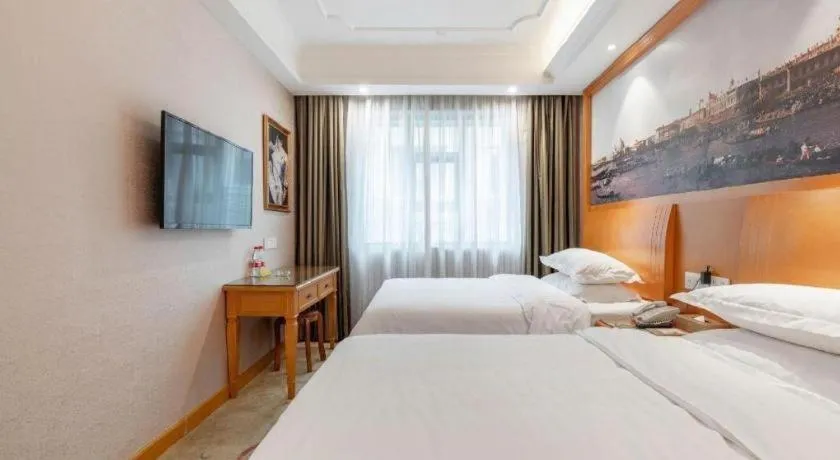 Bed in Vienna Hotel Changsha Wuyi Avenue Railway Station