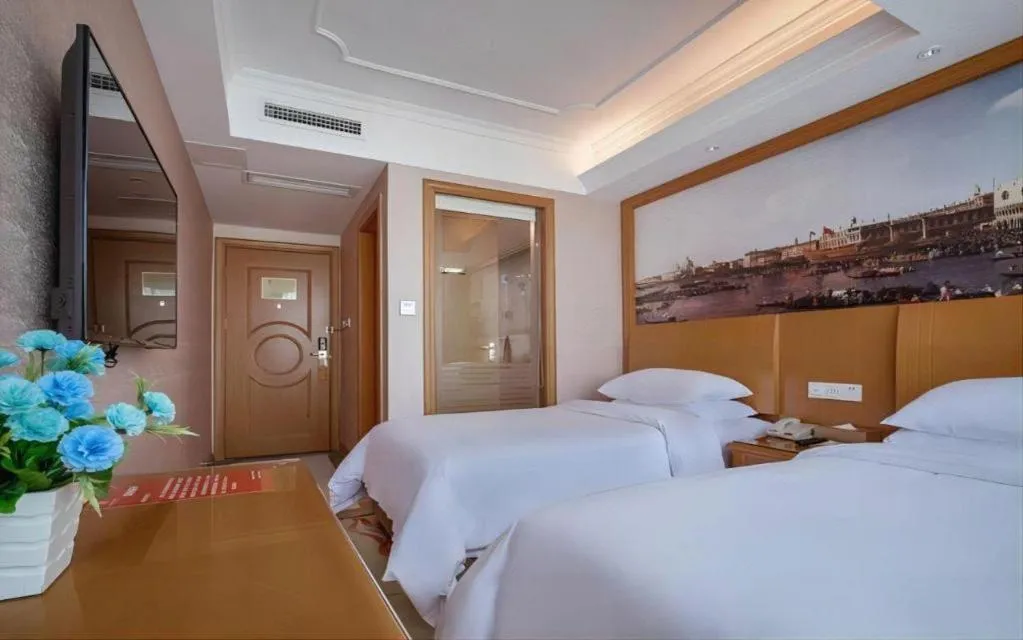 Bed in Vienna Hotel Changsha Wuyi Avenue Railway Station