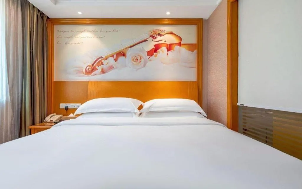 Bed in Vienna Hotel Changsha Wuyi Avenue Railway Station