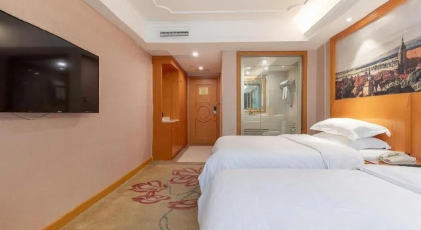 Bed in Vienna Hotel Changsha Wuyi Avenue Railway Station