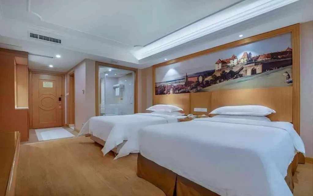Bed in Vienna Hotel Changsha Wuyi Avenue Railway Station