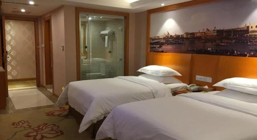 Bed in Vienna Hotel Changsha Wuyi Avenue Railway Station