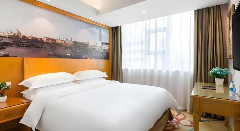 Bed in Vienna Hotel Changsha Wuyi Avenue Railway Station