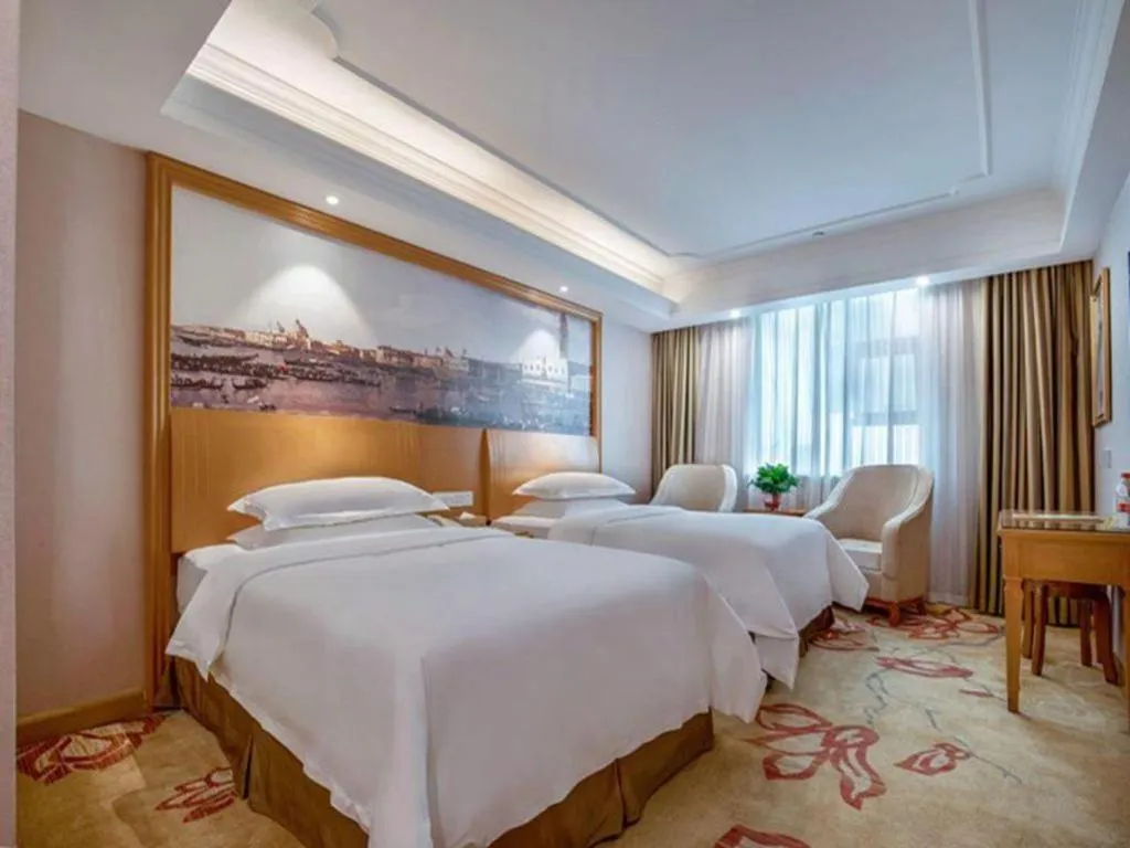 Bed in Vienna Hotel Changsha Wuyi Avenue Railway Station