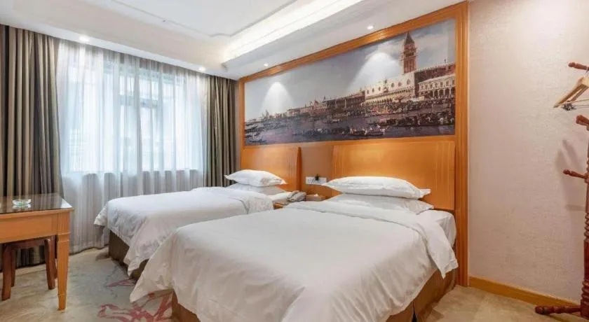 Bed in Vienna Hotel Changsha Wuyi Avenue Railway Station