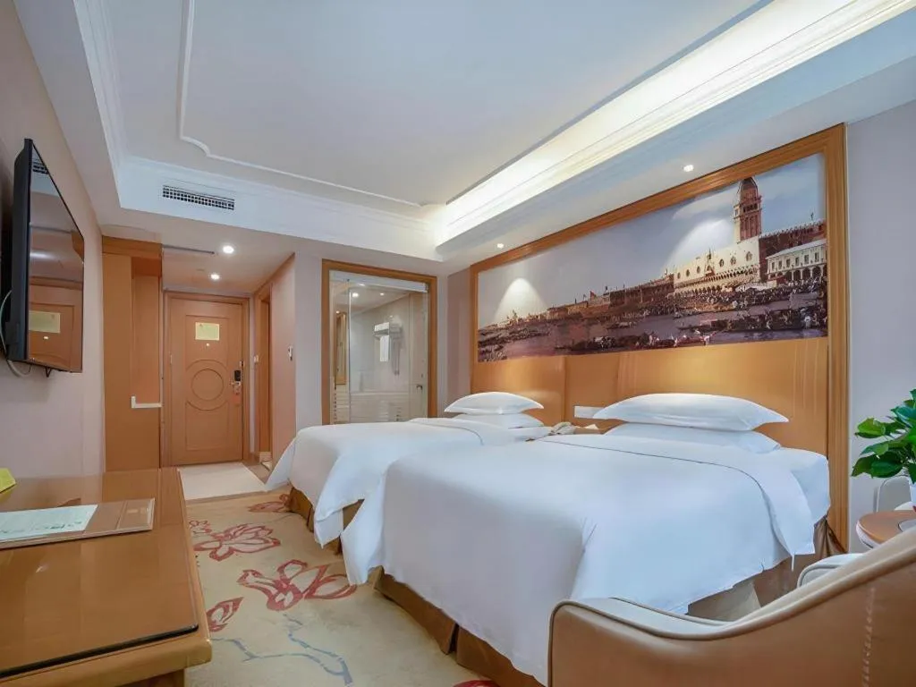 Bed in Vienna Hotel Changsha Wuyi Avenue Railway Station