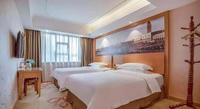 Bed in Vienna Hotel Changsha Wuyi Avenue Railway Station