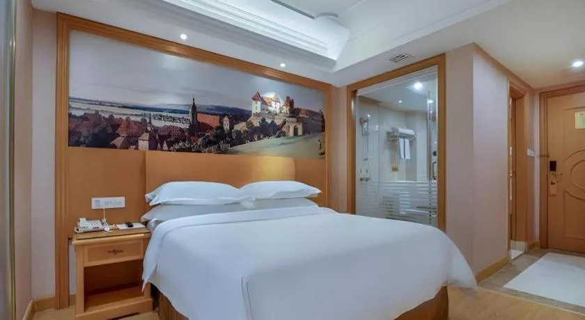 Bed in Vienna Hotel Changsha Wuyi Avenue Railway Station