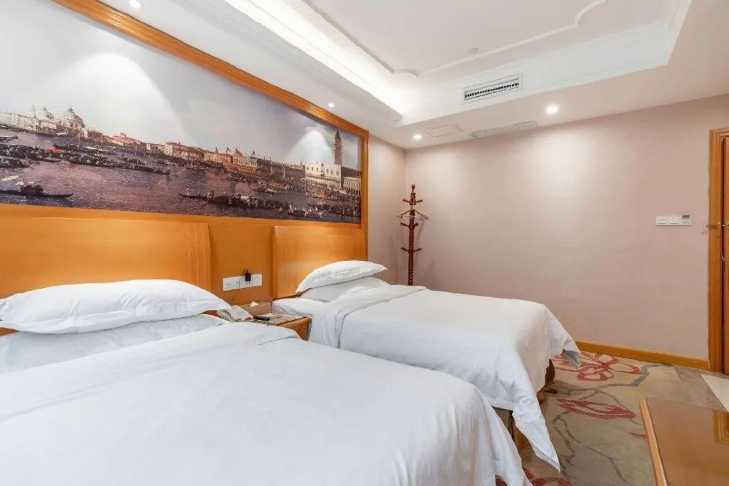 Bed in Vienna Hotel Changsha Wuyi Avenue Railway Station