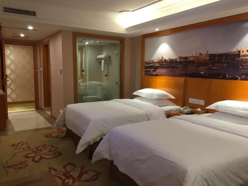 Bed in Vienna Hotel Changsha Wuyi Avenue Railway Station
