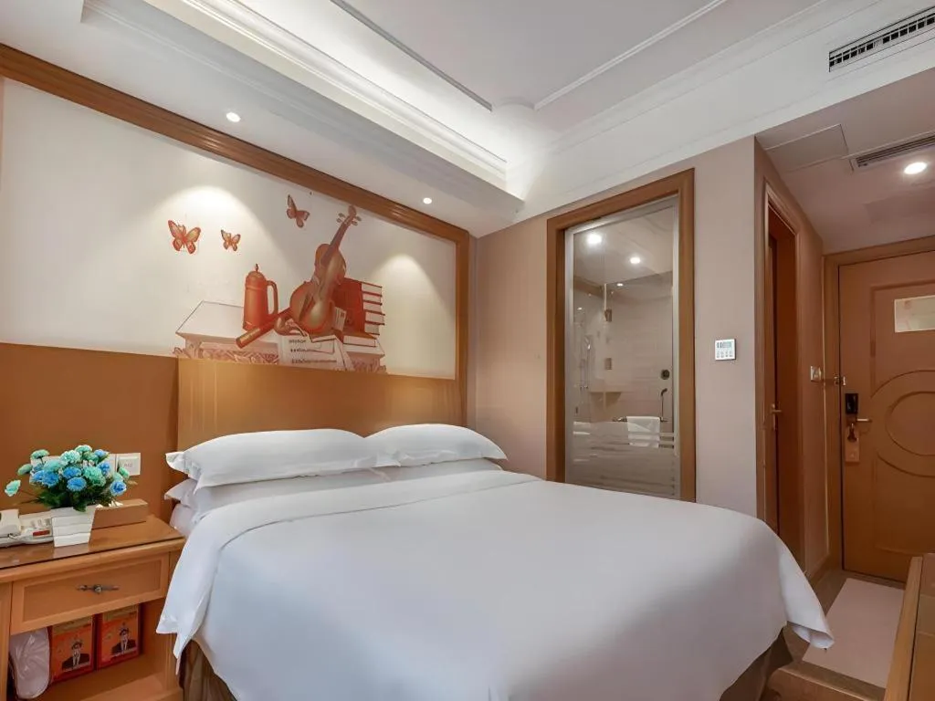 Bed in Vienna Hotel Changsha Wuyi Avenue Railway Station