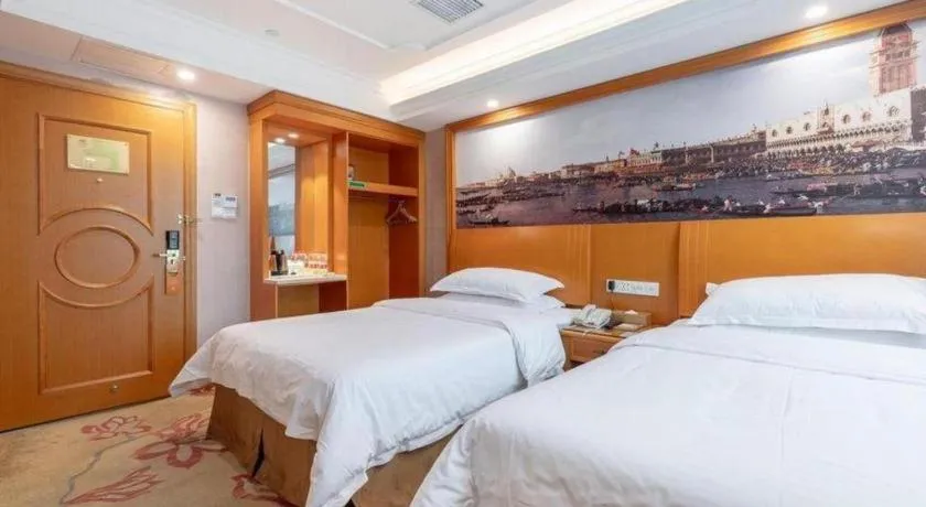 Bed in Vienna Hotel Changsha Wuyi Avenue Railway Station