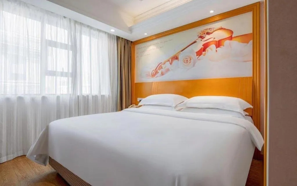 Bed in Vienna Hotel Changsha Wuyi Avenue Railway Station