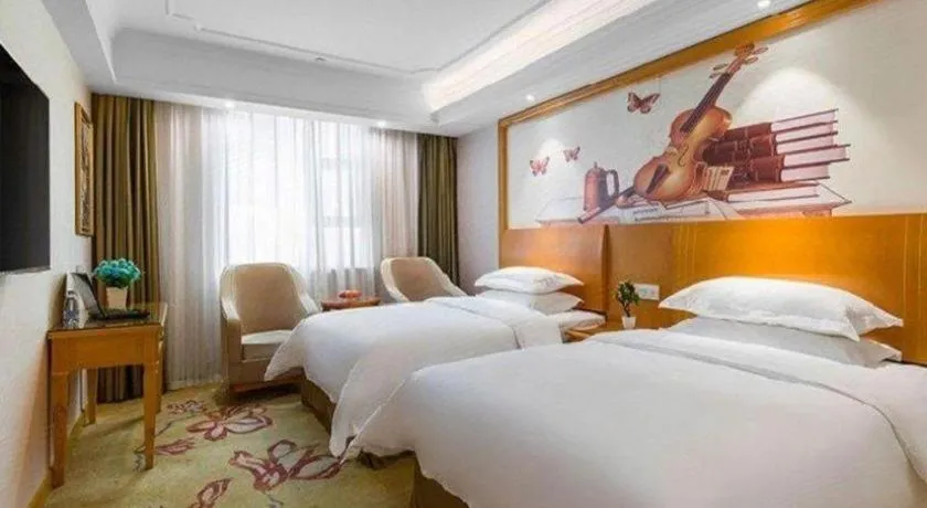 Bed in Vienna Hotel Changsha Wuyi Avenue Railway Station