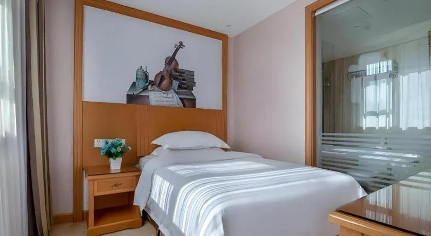 Bed in Vienna Hotel Changsha Wuyi Avenue Railway Station