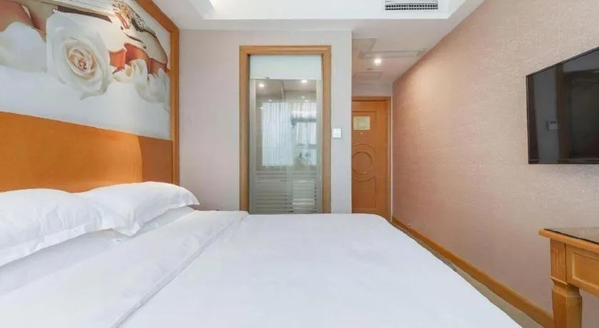 Bed in Vienna Hotel Changsha Wuyi Avenue Railway Station