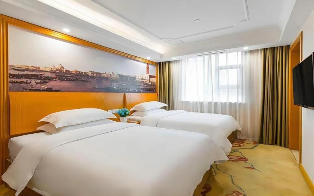 Bed in Vienna Hotel Changsha Wuyi Avenue Railway Station