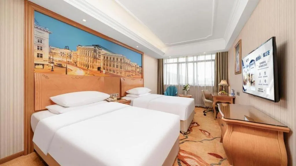 Bed in Vienna Hotel Chengdu Airport Shuangliu Wanda