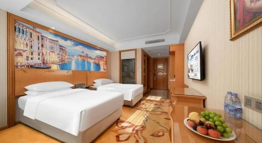 Bed in Vienna Hotel Chengdu Airport Shuangliu Wanda