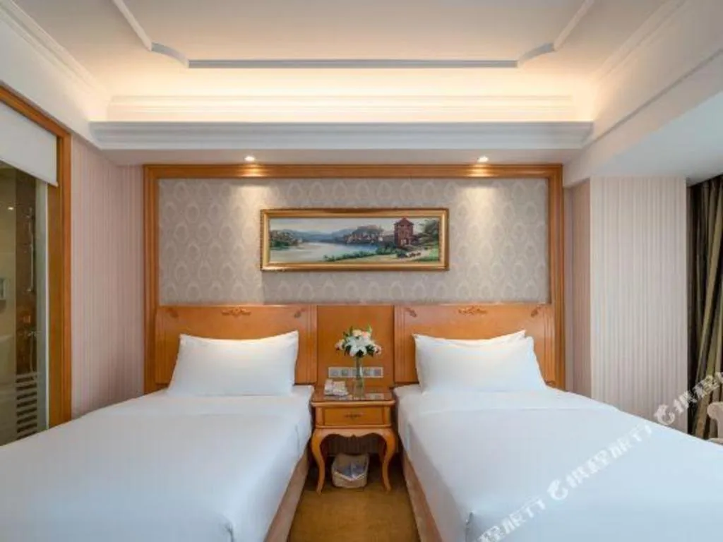Bed in Vienna Hotel Chengdu Airport Shuangliu Wanda