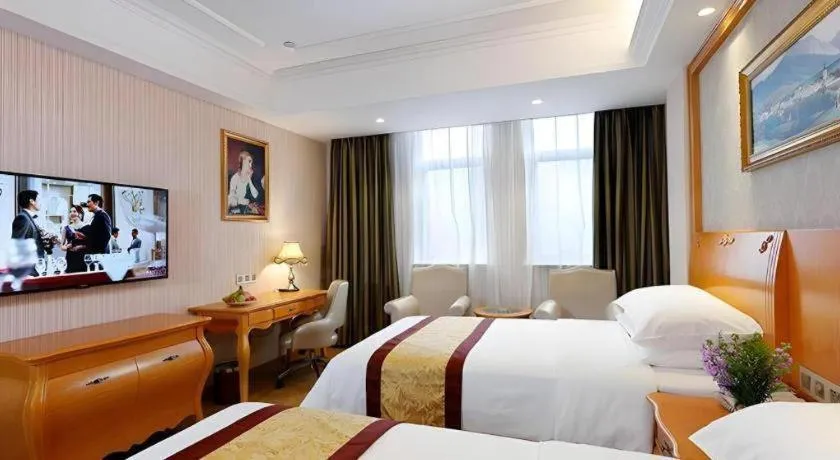 Bed in Vienna Hotel Chengdu Airport Shuangliu Wanda