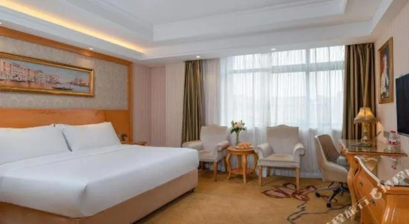 Bed in Vienna Hotel Chengdu Airport Shuangliu Wanda