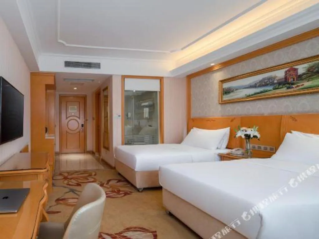 Bed in Vienna Hotel Chengdu Airport Shuangliu Wanda