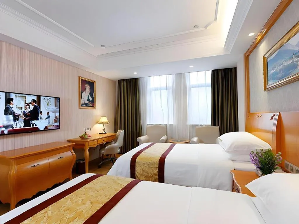 Bed in Vienna Hotel Chengdu Airport Shuangliu Wanda